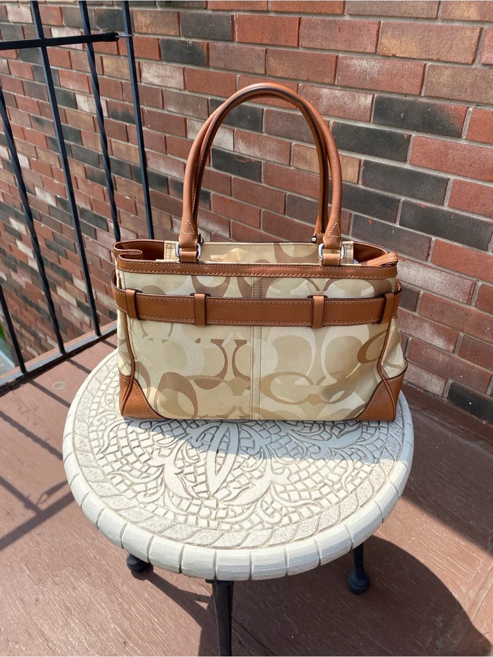 Coach satchel signature